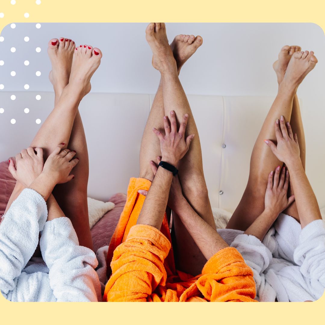 People's legs and arms in a group setting with a yellow border.